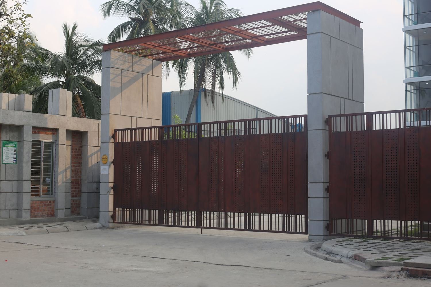 Fabricated MS gate and grill installed at a compound wall